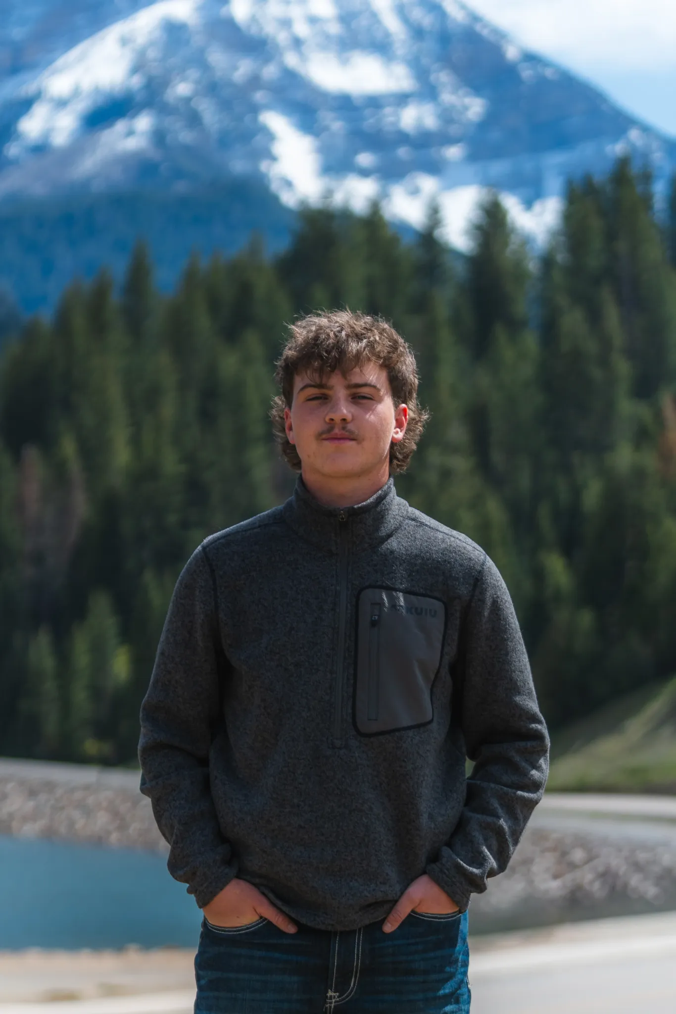 Cohen Hardle standing outdoors in the mountains
